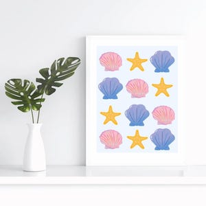 May include: A printable wall art design featuring a repeating pattern of pink and purple seashells and yellow starfish on a light blue background.