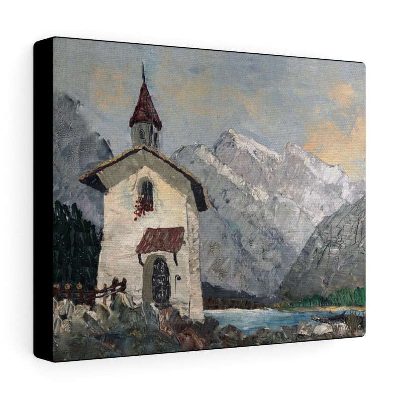 May include: A painting of a small white chapel with a red roof, set against a backdrop of snow-capped mountains and a calm blue lake. The chapel has a small window and a wooden door. The mountains are painted in shades of gray and white, with hints of blue in the sky.