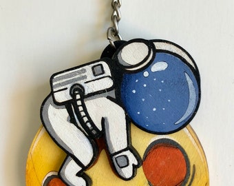 WOODEN ASTRONAUT KEYCHAIN
