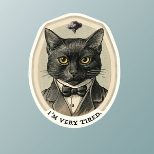 May include: A black cat wearing a bow tie and a tuxedo, with a thought bubble above its head. The text below the cat reads "I'm very tired."