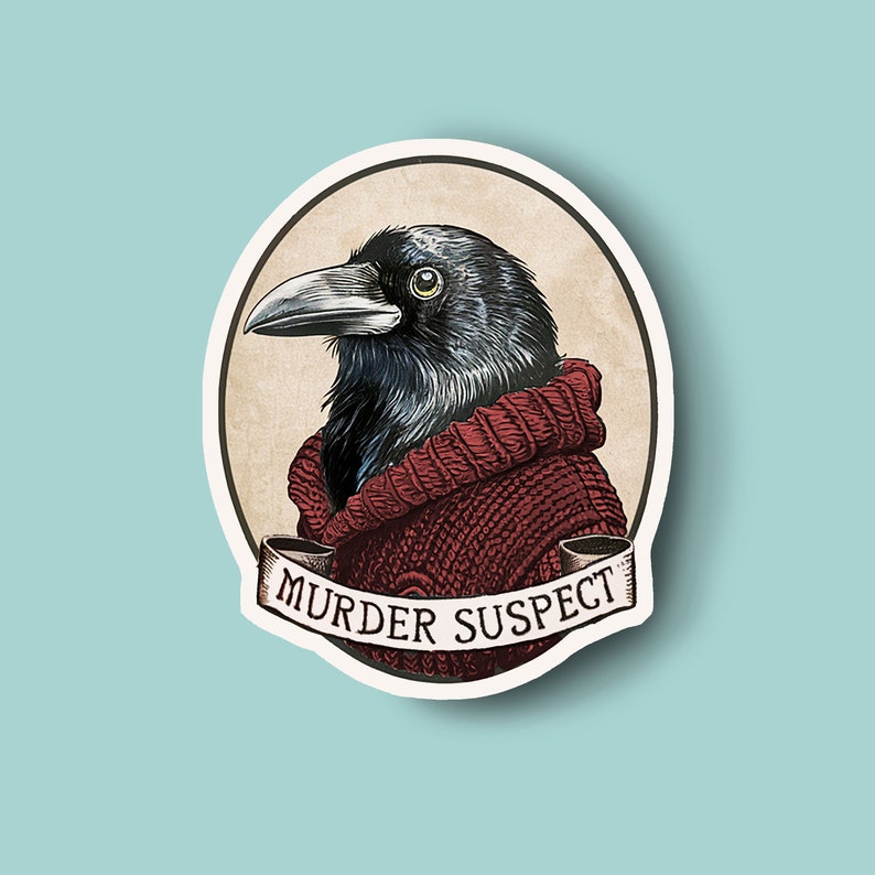 May include: A sticker featuring a detailed illustration of a raven wearing a red sweater. The raven is set against a tan background within a white oval. A banner below reads "MURDER SUSPECT". The sticker has a light blue background.