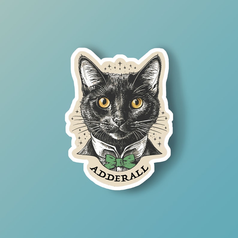 May include: A black cat with a green bow tie and the word "Adderall" printed below. The cat is drawn in a vintage style with a white background.
