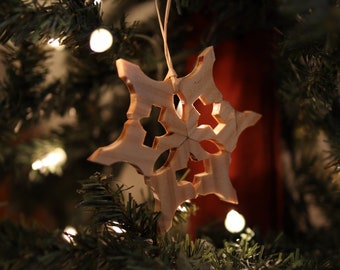 Handmade wooden decorative snowflake holiday ornament