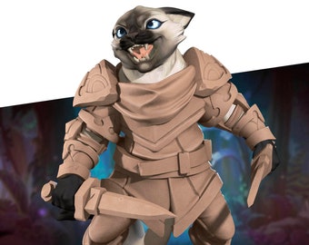 May include: A figurine of a cat wearing armour and holding a dagger. The cat is painted in a light brown colour and has blue eyes. The figurine is standing on a base with a small bag.