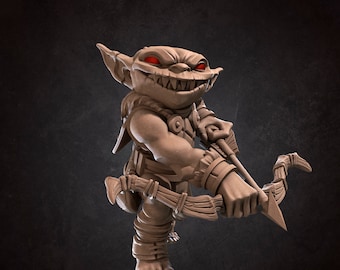 May include: A small, green goblin figurine with red eyes and a menacing grin, holding a bow and arrow. The goblin is wearing leather armor and has a fierce expression.