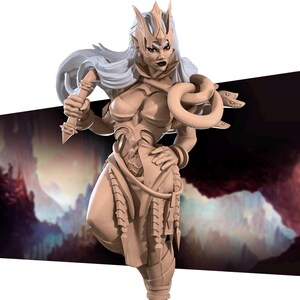 May include: A detailed figurine of a female figure with a crown, a snake wrapped around her arm, and a staff in her hand. The figure is made of a light brown material and has a detailed design.