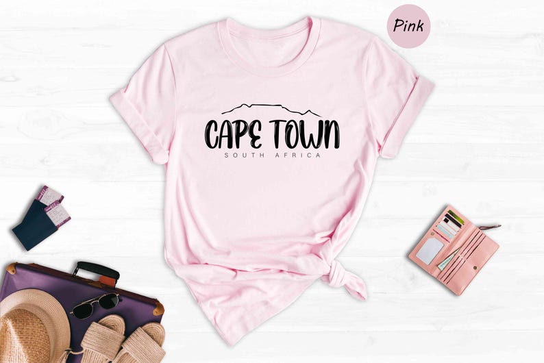 a pink t - shirt with the words cape town on it