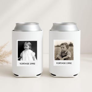two white can holders with black and white photographs of children, labeled as "VINTAGE 1992".