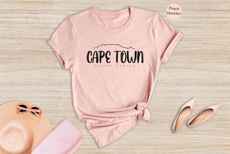 a pink shirt with the words cape town on it