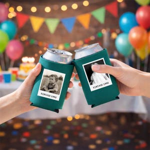 Two hands holding green beverage holders with black and white photos of children, likely from the year 1992, against a background of colorful balloons and a festive atmosphere.