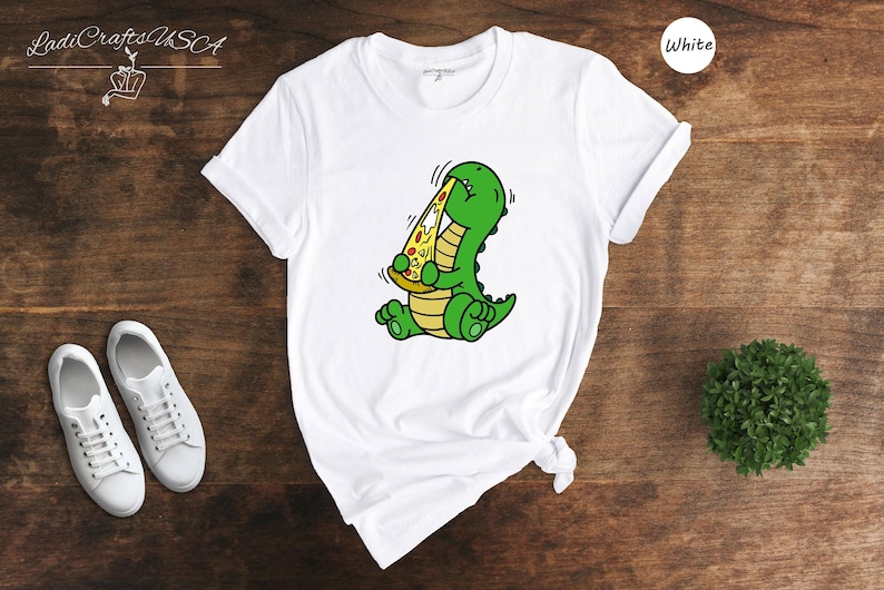 Dino Lover Gift Tee: Dinosaur Eating Pizza Design, Funny Dino Pizza Shirt | Cotton Blend, Unisex Sizes XS-XXL image 1