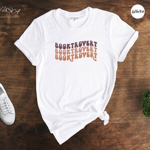 Booktrovert Shirt Introvert Tee: Book Lover Design, Unisex Cotton Blend | Relaxed Fit, Multiple Colors | Sizes S-XXL image 1