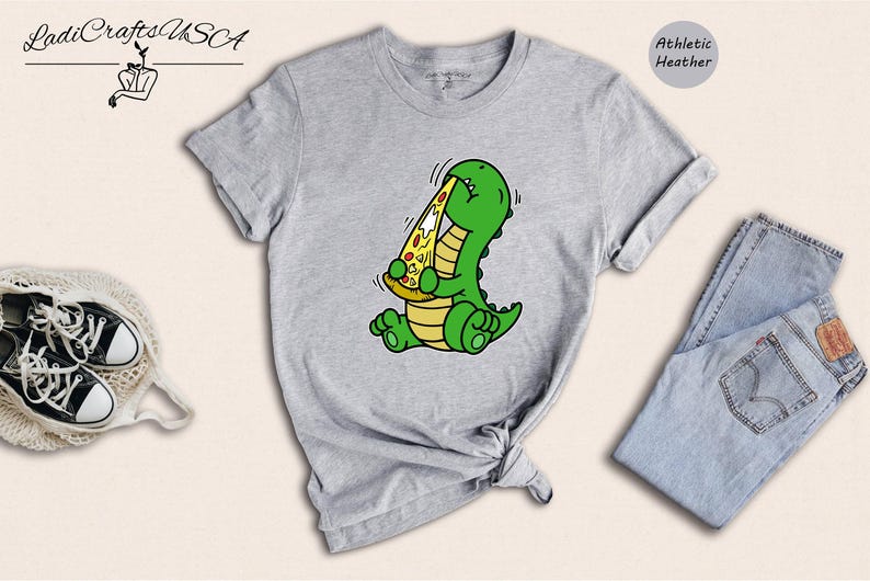 Dino Lover Gift Tee: Dinosaur Eating Pizza Design, Funny Dino Pizza Shirt | Cotton Blend, Unisex Sizes XS-XXL image 2