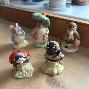 Group Beatrix Potter figures (5), Royal Albert (4), Royal Doulton Studio/Beswick (1), England vintage 1989-1998 hand painted and glazed