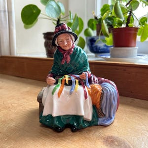 Royal Doulton street seller, England vintage c1985, Silks and Ribbons, hand made and decorated porcelain figure, model HN 2017 H15.5cm