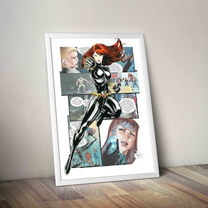 May include: A framed comic book print featuring Black Widow, a superheroine in a black suit, with red hair and a determined expression. The print includes multiple panels with other characters, including Captain America and Iron Man.
