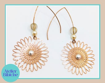 Sun earrings in rose gold metal. Handmade earrings with 1 year warranty