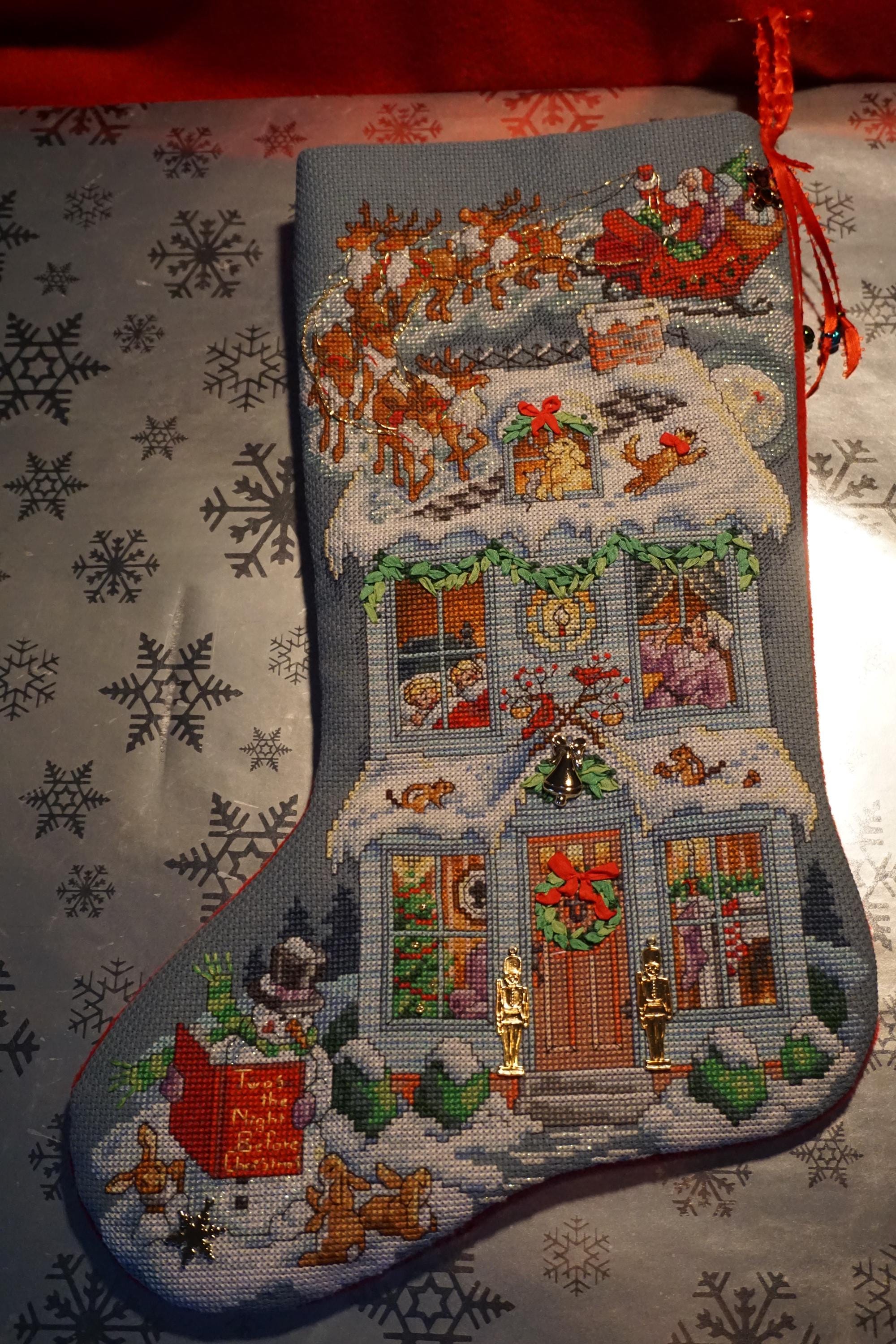 Up on the Rooftop w/golden charms. Handmade cross-stitched Christmas stocking, fully finished. Custom, quality heirloom, mantel decoration.