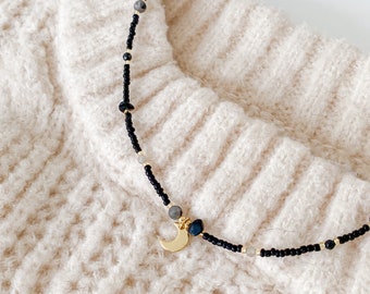 Grounding black and gold gemstone necklace · Crescent moon charm · tourmaline labradorite spinel mix ·