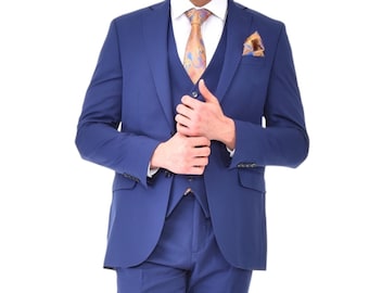 May include: A blue suit with a matching vest and a patterned tie. The suit jacket has a single button closure and a pocket square.