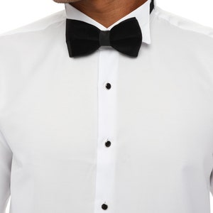 Get a white tuxedo shirt with Cufflinks will add depth to any mens' wardrobe this luxury dinner shirt is a classic choice. This is a long-sleeved luxury shirt made from a natural viscose blend and Double Cuff for ease and comfort.