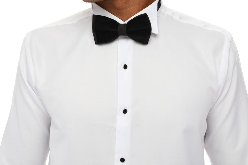 Get a white tuxedo shirt with Cufflinks will add depth to any mens' wardrobe this luxury dinner shirt is a classic choice. This is a long-sleeved luxury shirt made from a natural viscose blend and Double Cuff for ease and comfort.
