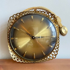 Vintage MCM German brass wall hanging clock - rope hanging - 20.5” tall with rope - 10” x 10” clock face