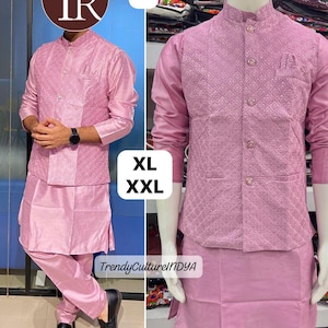 May include: A two-piece pink outfit, including a long-sleeved shirt and matching pants, paired with a patterned vest. The outfit is displayed on a mannequin and a person. The text "XL XXL" is visible. The brand name "TrendyCultureINDYA" is also visible.