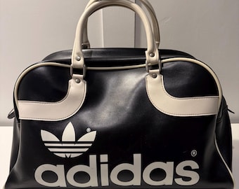 Adidas  Bag.  1970’s . Finished in the classic  black and white.  Fantastic Condition inside and out.