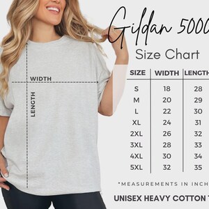 May include: A light grey short-sleeve t-shirt with a size chart titled Gildan 5000 Size Chart. The chart lists sizes S through 5XL with corresponding width and length measurements in inches, ranging from 18 to 32 inches wide and 28 to 35 inches long.