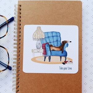 Block notes con Cane in relax sulla poltrona