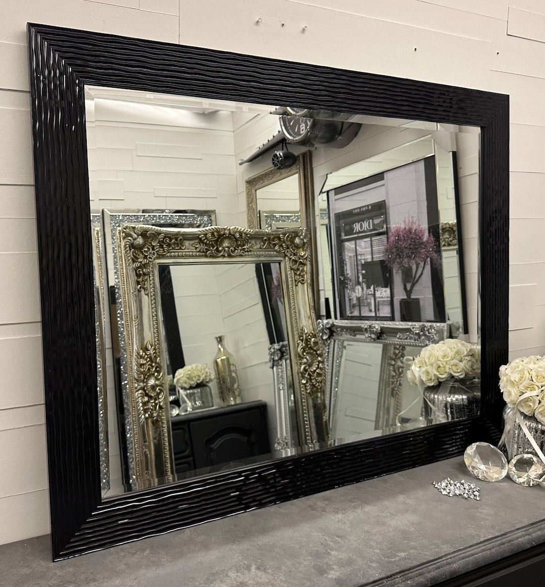 Espejo grande con marco negro Efecto de metal fundido Elegante