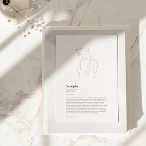 以下が含まれることがあります： 人の顔のミニマルな線画で、"蠍座"というテキストと、占星術の星座の特性の説明が書かれています。背景は白です。