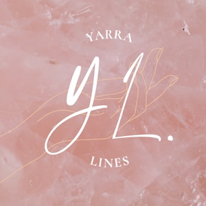 May include: A pink background with the words "YARRA" and "LINES" in white script. The letters "YL" are in a large, stylized font. A gold outline of a hand is also visible.