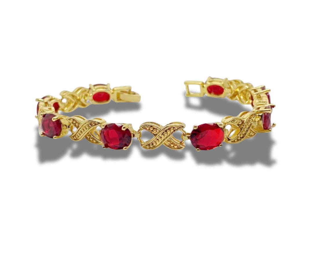 A gold 'kiss' design bracelet main image 0