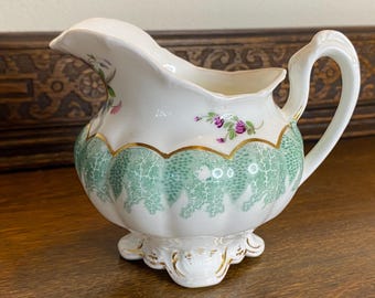 Jarra de porcelana antigua con diseño floral pintada a mano para crema