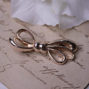 Vintage tie bow brooch, Vintage ribbon silver tone brooch