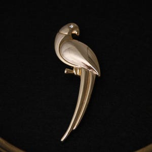 Vintage parrot brooch with rhinestone eye Gold tone tropical bird brooch