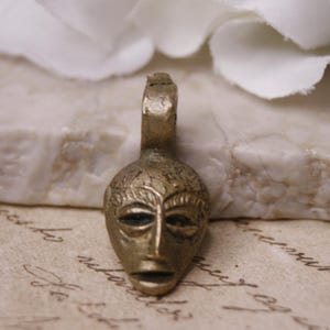 African brass mask pendant Vintage tribal mask Tiny face mask amulet