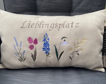 Personalized cushions with flowers, individually embroidered with a name or text