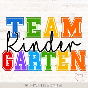 May include: A vibrant graphic featuring the text "TEAM Kindergarten". The word "TEAM" is in blue, green, yellow, and orange, while "Kindergarten" is in red, purple, green, and orange. The design is set against a white wood-effect background.