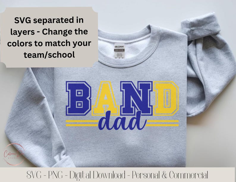 May include: A gray sweatshirt with the words "BAND dad" in blue and yellow lettering. The text "SVG separated in layers - Change the colors to match your team/school" is in a light beige box. The bottom of the image reads "SVG - PNG - Digital Download - Personal & Commercial".