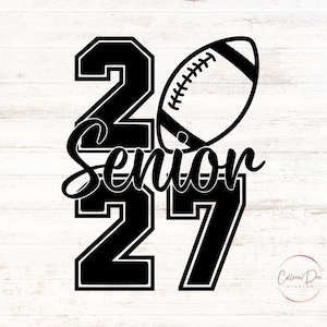 May include: A black graphic design featuring the large numbers 2027 with the word Senior written in a cursive script across the middle. A football illustration is positioned above the word Senior, replacing the zero in the year 2027.