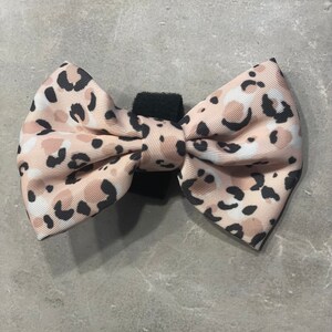 Pink leopard print dog bow