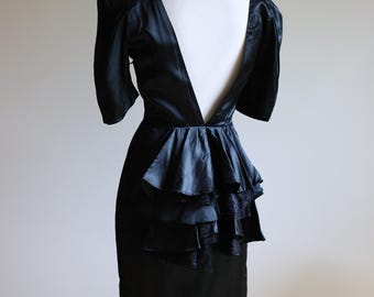 Vintage 80s Black Satin Peplum Dress with Dramatic Puff Sleeves & Deep V Back with Ruffle Bustle | High Neck Retro Cocktail Wedding Guest