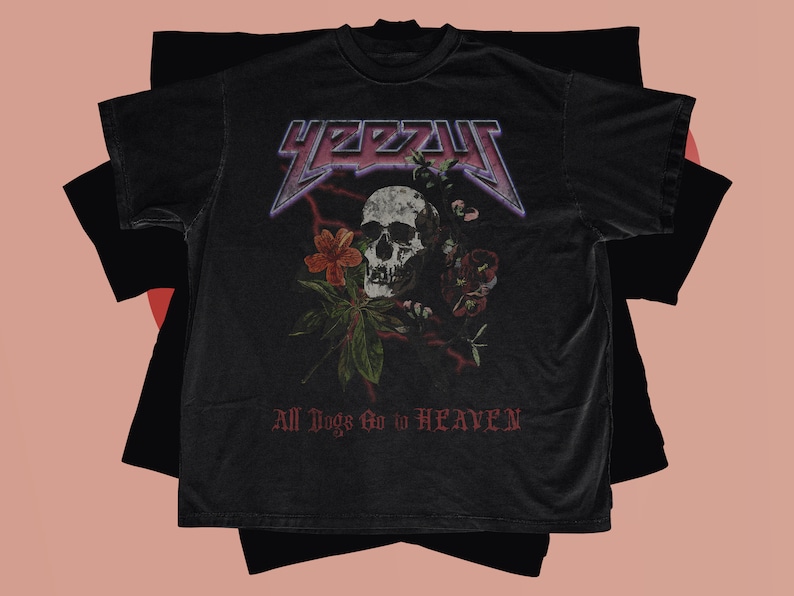 May include: Black t-shirt with a graphic of a skull with flowers and the text "YEEZY" and "All Dogs Go to Heaven".