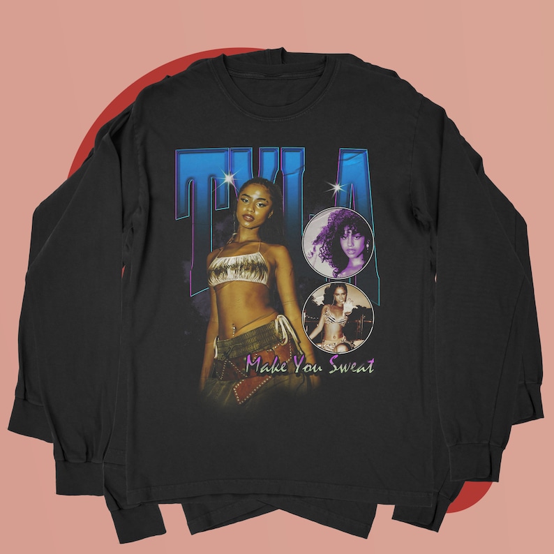 May include: Black long-sleeve t-shirt with a vintage-style graphic featuring a woman with the text "TILA Make You Sweat".