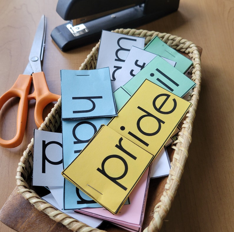 May include: A wicker basket filled with colorful flash cards with words like "pride" and "try".