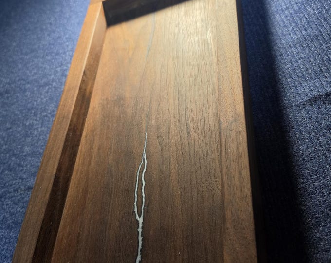 Custom black walnut valet tray shocked & filled with half white and half pink epoxy