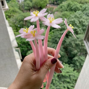 Bolígrafo de gel con forma de flor rosa, bonito, material escolar kawaii, papelería, manualidades para niños